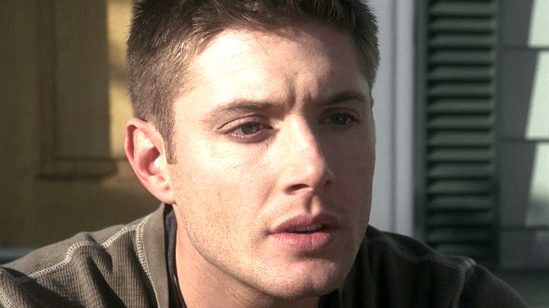 Dean Winchester sitting by door