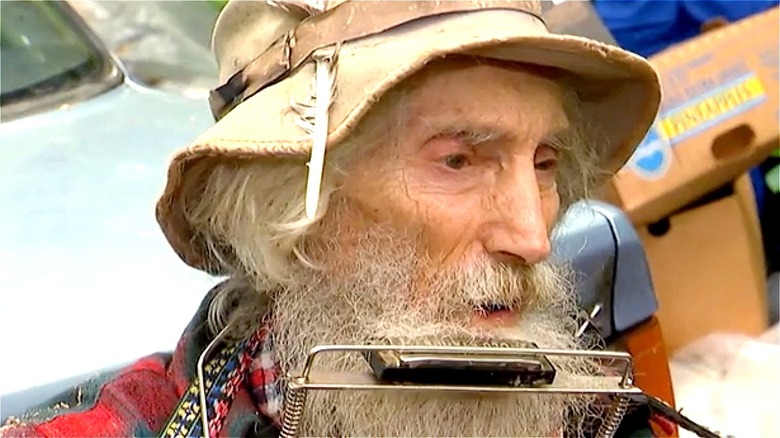 Hobo Jack playing the harmonica