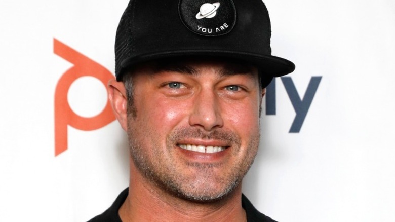 Taylor Kinney looking happy