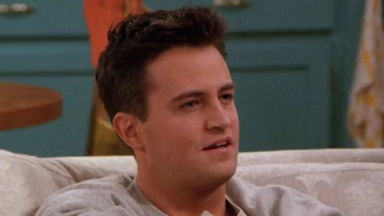 Chandler on Monica's couch