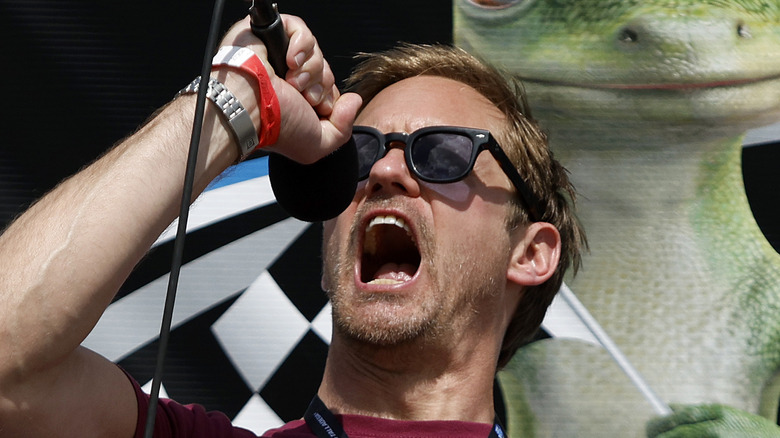 Skarsgard screams into microphone