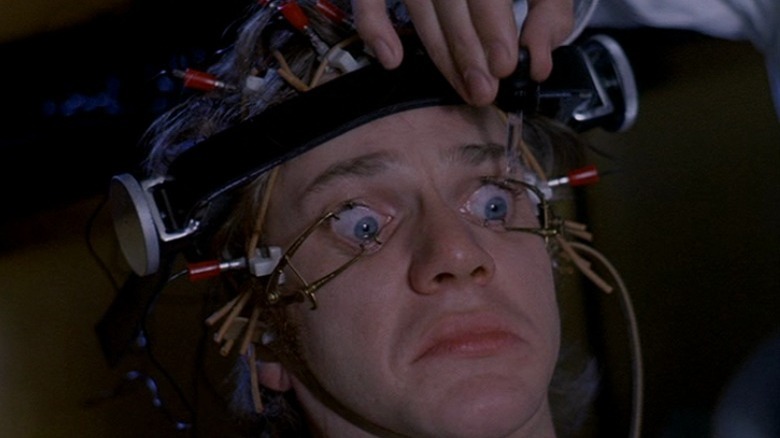 Alex wearing the eye contraption in A Clockwork Orange