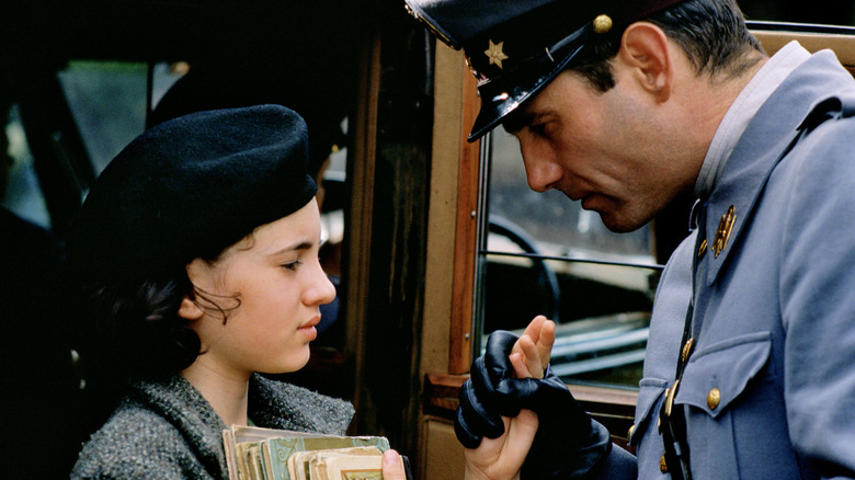 Vidal grabs Ofelia by the hand in Pan's Labyrinth