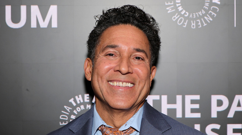Oscar Nunez smiling