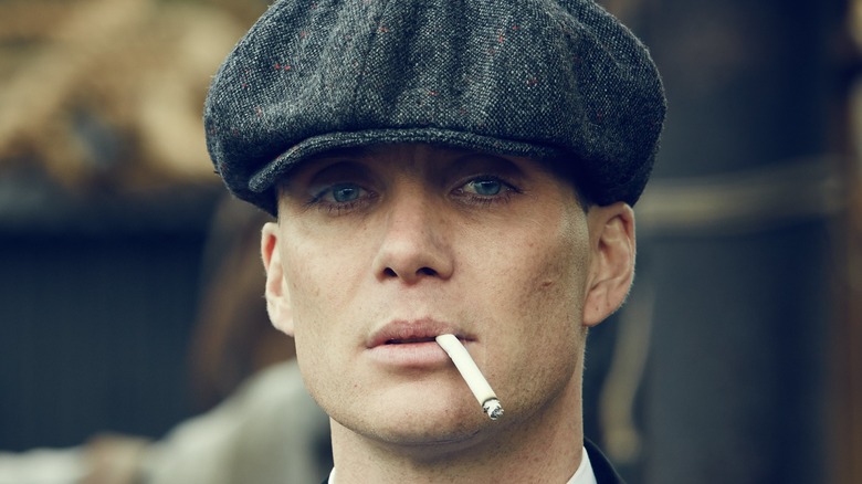 Tommy Shelby smoking a cig