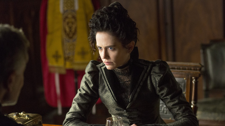 Vanessa sitting in priest's office