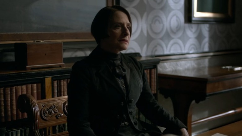 Dr. Seward sitting in her office