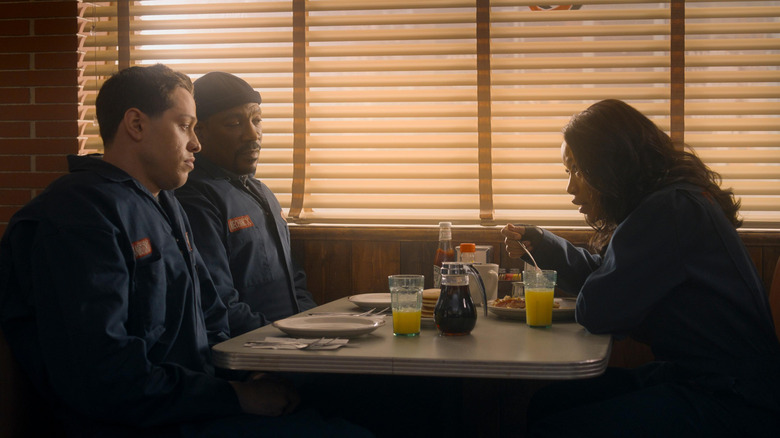 Russell, Travis, and Zoe eating at a diner in The Pickup