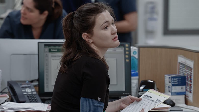 Dr. Santos sitting in the ER