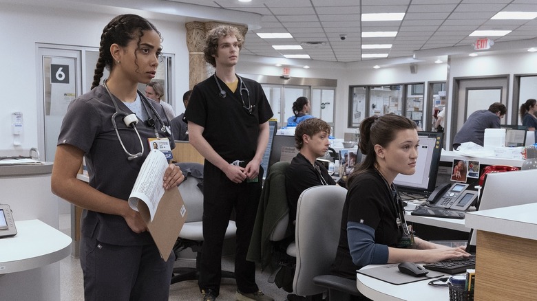 Emma, James, Whitaker, and Santos in the nurse's station on The Pitt