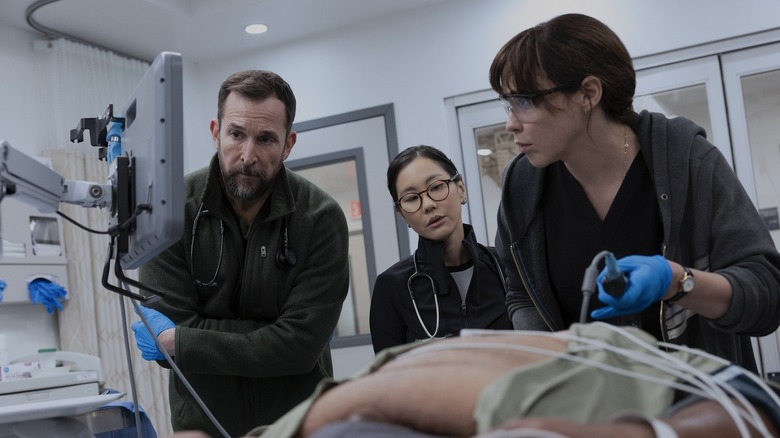 Robby, Joy, and Cassie treating a patient on The Pitt Season 2