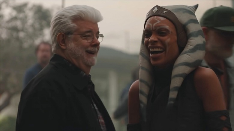 George Lucas laughing with Rosario Dawson as Ahsoka