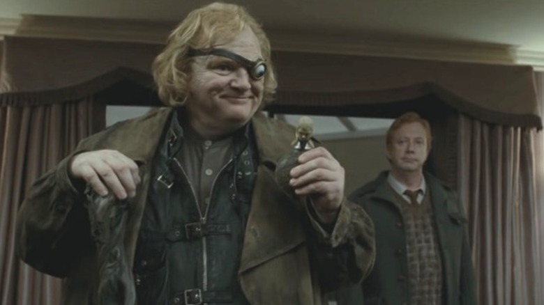 Mad-Eye holding Polyjuice Potion 