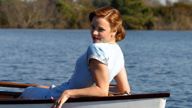 Allie sitting in boat looking over her shoulder in The Notebook (2004)