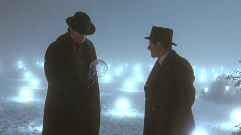 Mr. Alley shows Robert a lightbulb