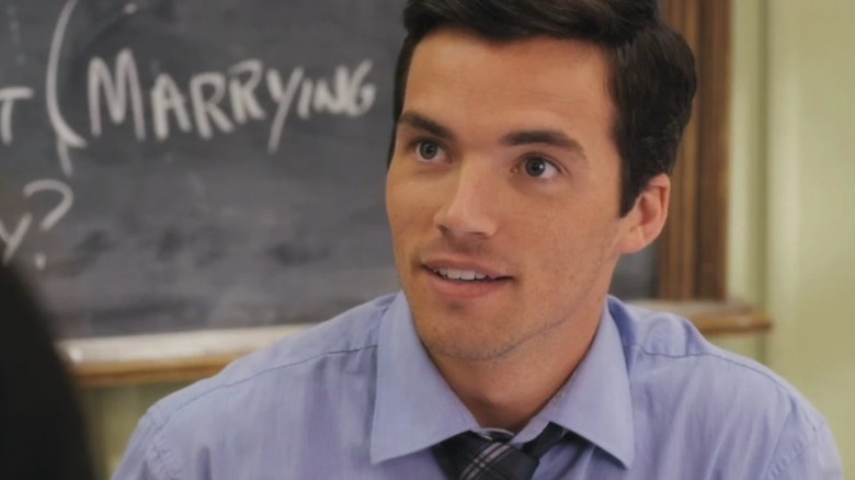 Ezra talks to a student