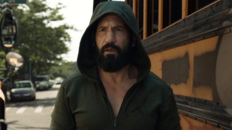 Frank Castle next to a school bus in Punisher: One Last Kill