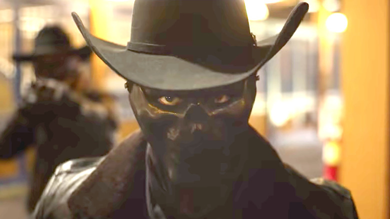 The Forever Purge cowboy looking on