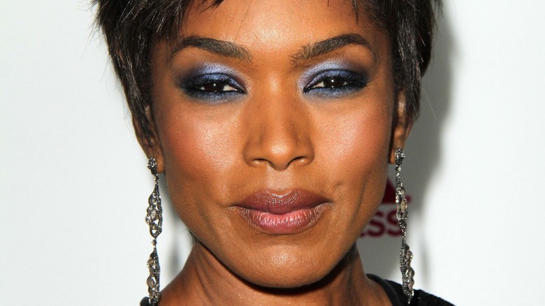 Angela Bassett smirking