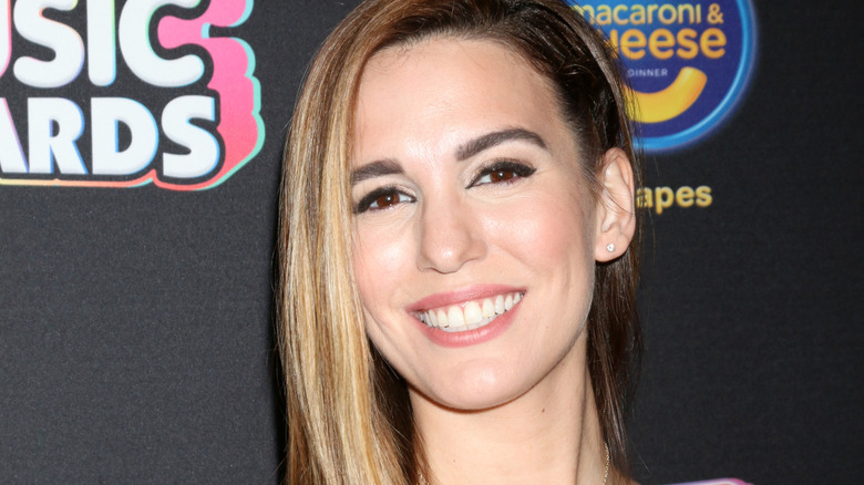 Christy Carlson Romano smiles at an award show