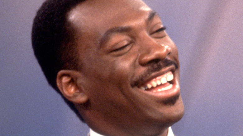 Eddie Murphy laughs