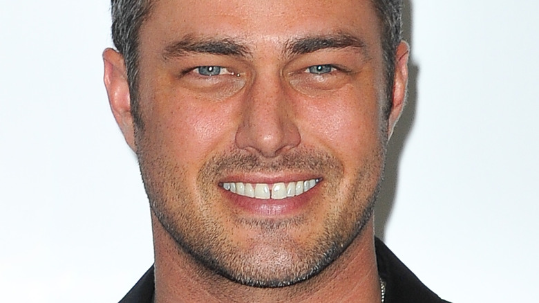 Taylor Kinney smiling 