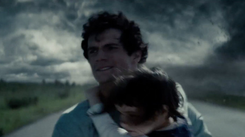Clark Kent running from tornado