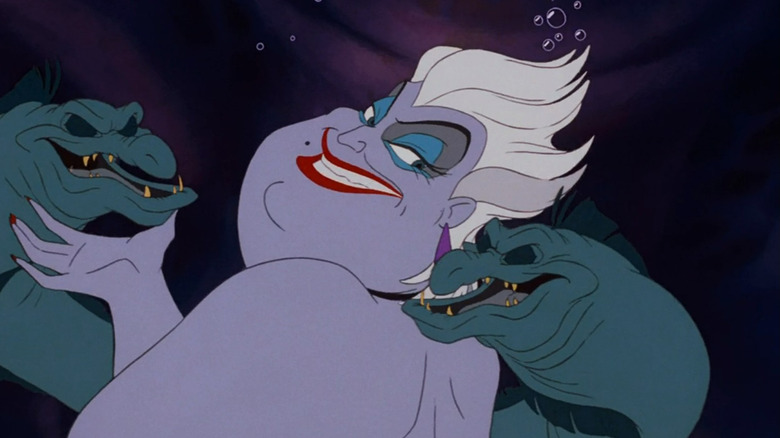 Ursula caressing Flotsam and Jetsam