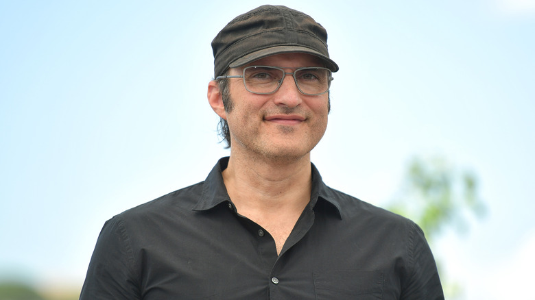 Robert Rodriguez smiling at the Cannes Film Festival in 2023.