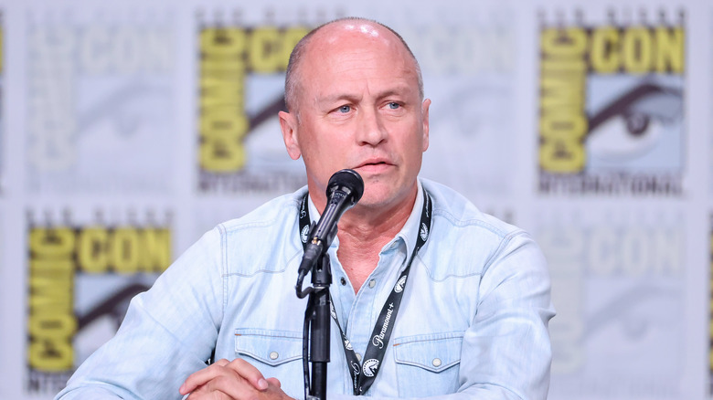 Mike Judge speaking into microphone
