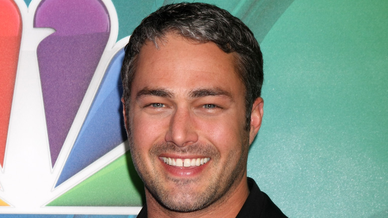 Taylor Kinney smiling