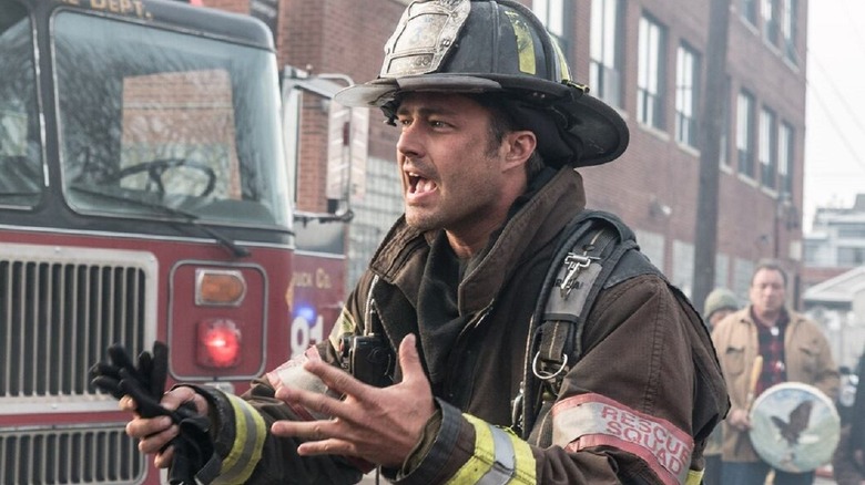 Kelly Severide in his firefighter costume