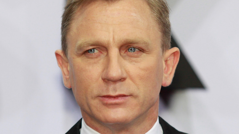 Daniel Craig with a neutral expression