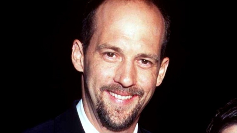 Anthony Edwards posing for photographers