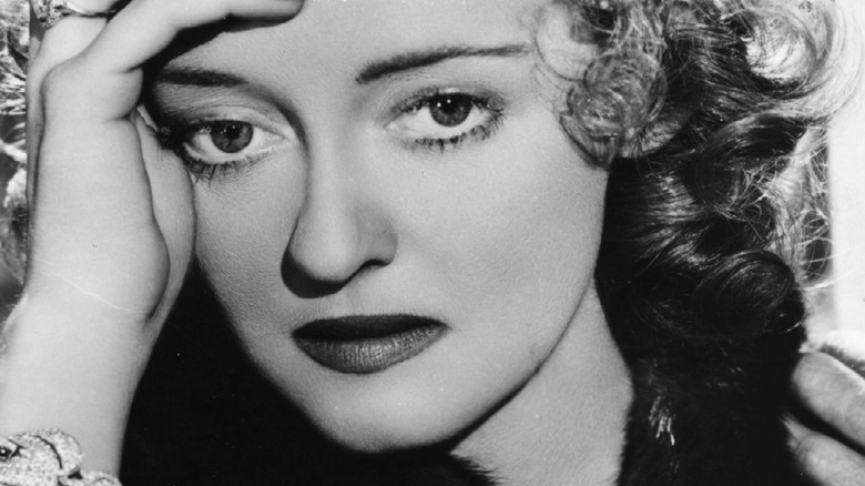 Bette Davis looking contemplative 