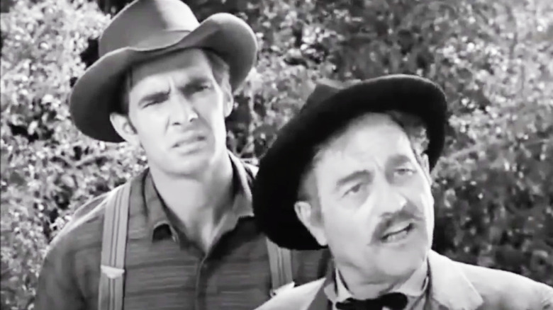 Dennis Weaver and Milburn Stone talking