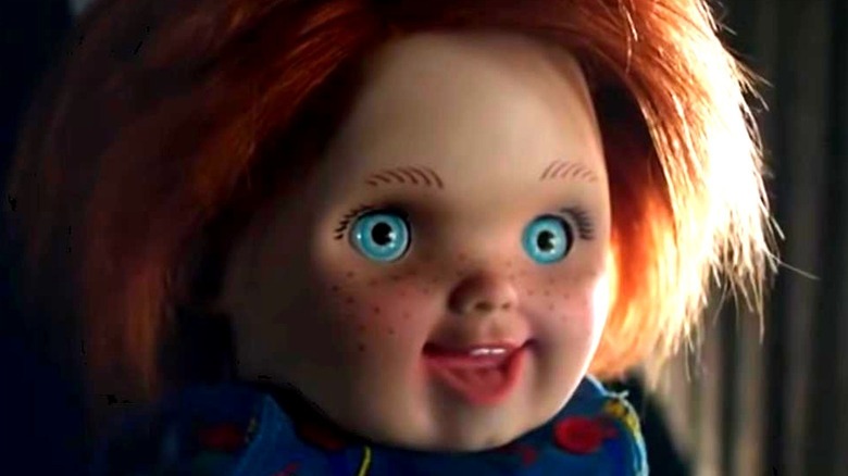 Chucky doll smiling in Cult of Chucky