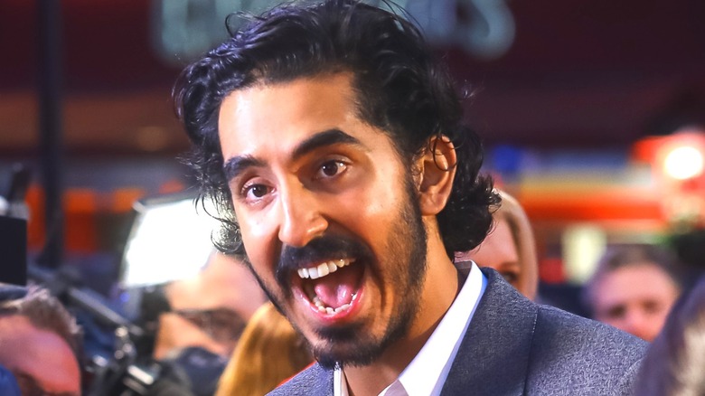 Dev Patel posing at event