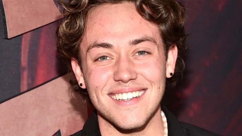 Ethan Cutkosky smiling