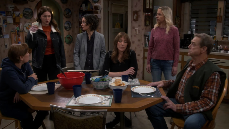 The Conners cast around a table