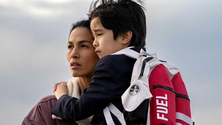 Thony and her son face the wind in 