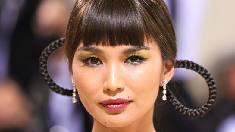 Gemma Chan wearing yellow eyeshadow