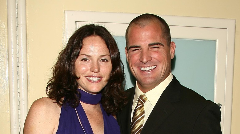 Jorja Fox and George Eads smiling