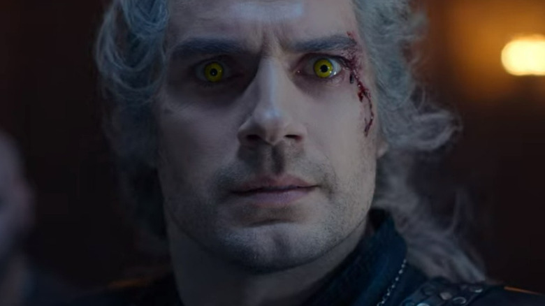 Geralt looking at Ciri