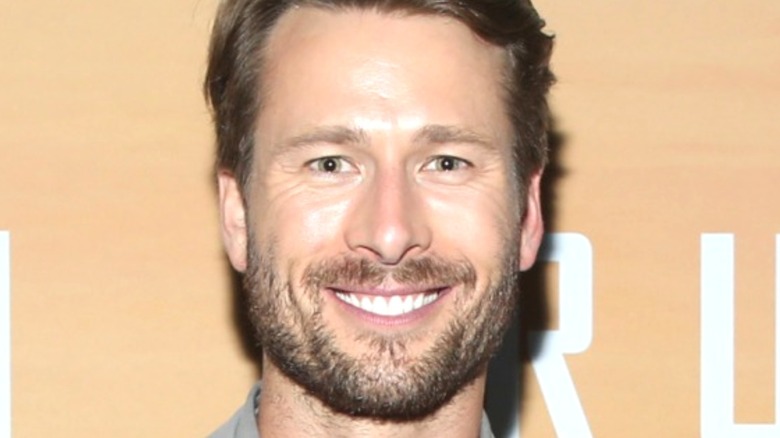 Glen Powell smiling