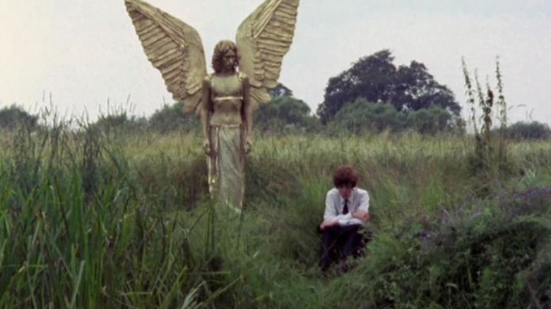 Angel and a man in a field