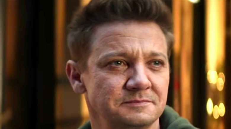 Jeremy Renner looks solemn