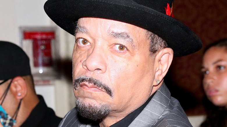 Ice-T wearing black hat