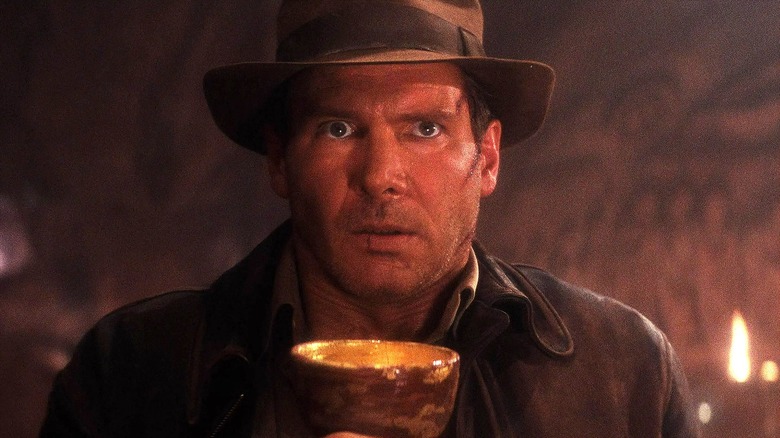 Indiana Jones holding the Holy Grail in Indiana Jones and the Last Crusade