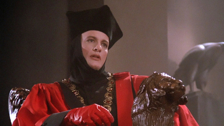 Q dressed in an elaborate costume in Star Trek: The Next Generation